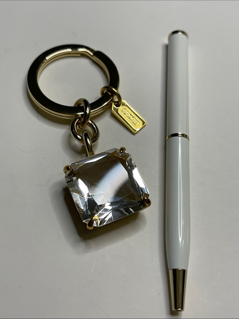 Coach Gold Tone Keyring with Large Square Crystal Charm and Coach Pen